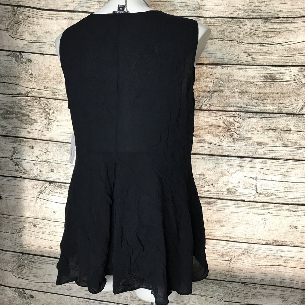 ana black sleeveless top Size XL. 


Pit to pit approx:  23 inches - Picture 3 of 7